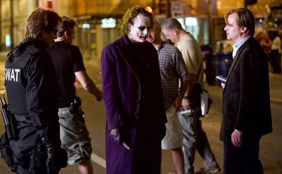 Nolan is talking to Ledger on the set of ‘The Dark Knight’. 