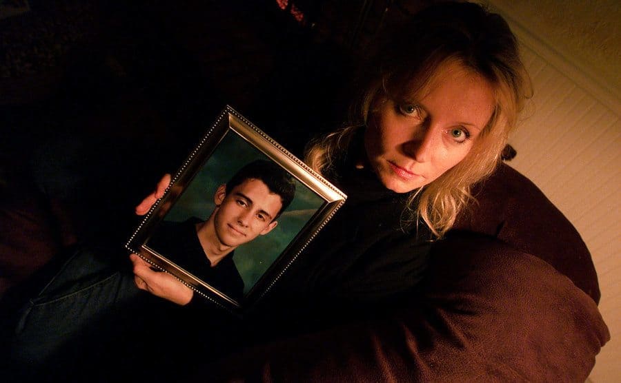 Susan Markovitz is holding a photo of her missing son, Nicholas.