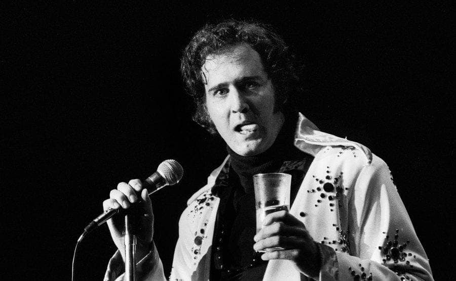 Close-up on Andy Kaufman impersonating Elvis Presley at the Park West in Chicago, circa 1978.
