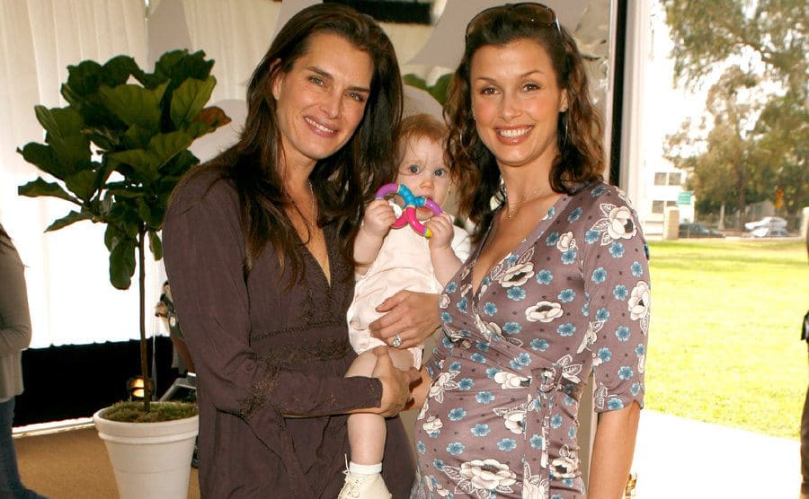 A mothers talk between Brooke Shields, who holds her newborn baby, and a pregnant Bridget.