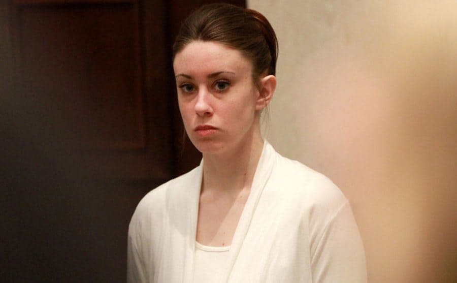 Casey Anthony is wearing a serious expression.