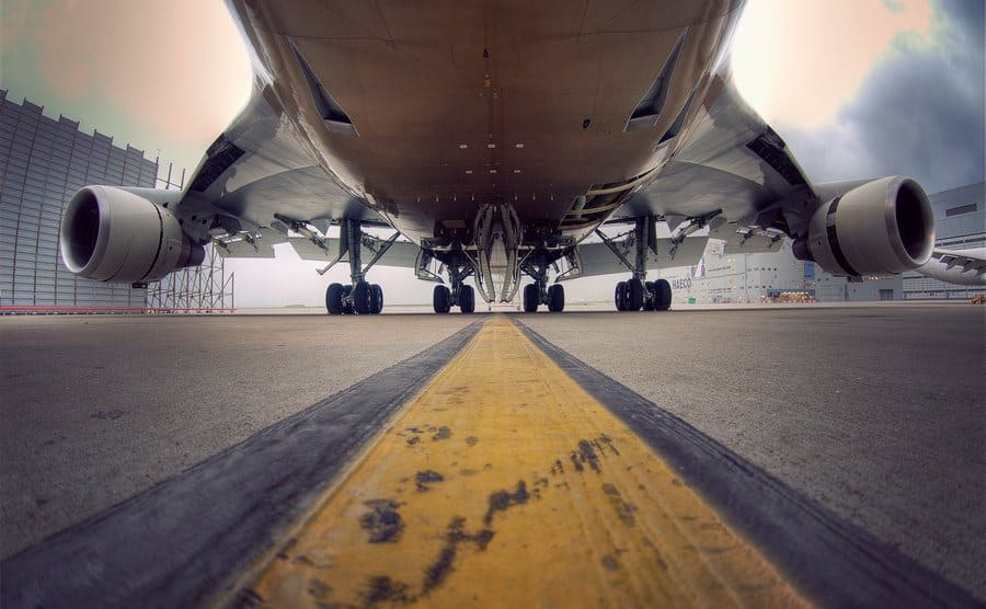 Ground level shot of the bottom of a plane.