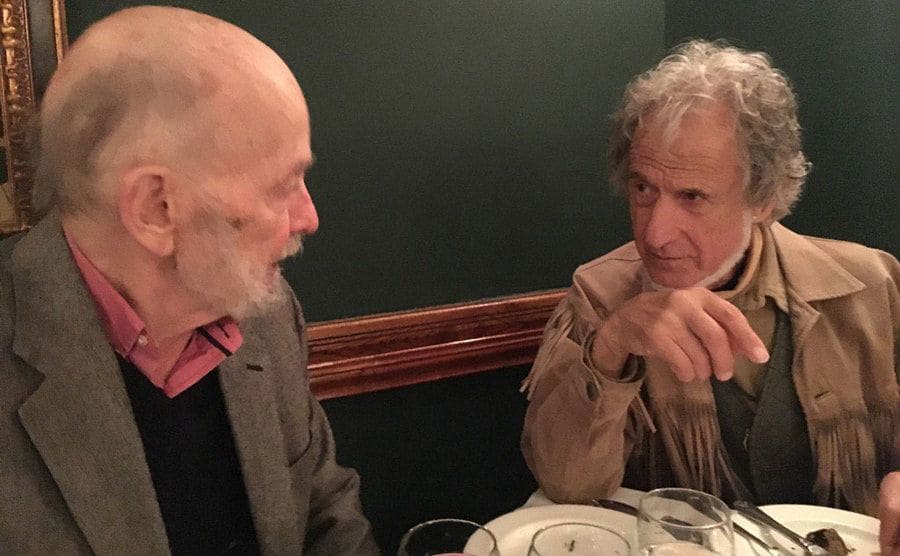 Recent photo of Burnham sitting next to Serpico having dinner and talking.