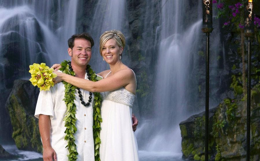 Jon and Kate pose in front of a waterfall in Hawaii after the ceremony. 