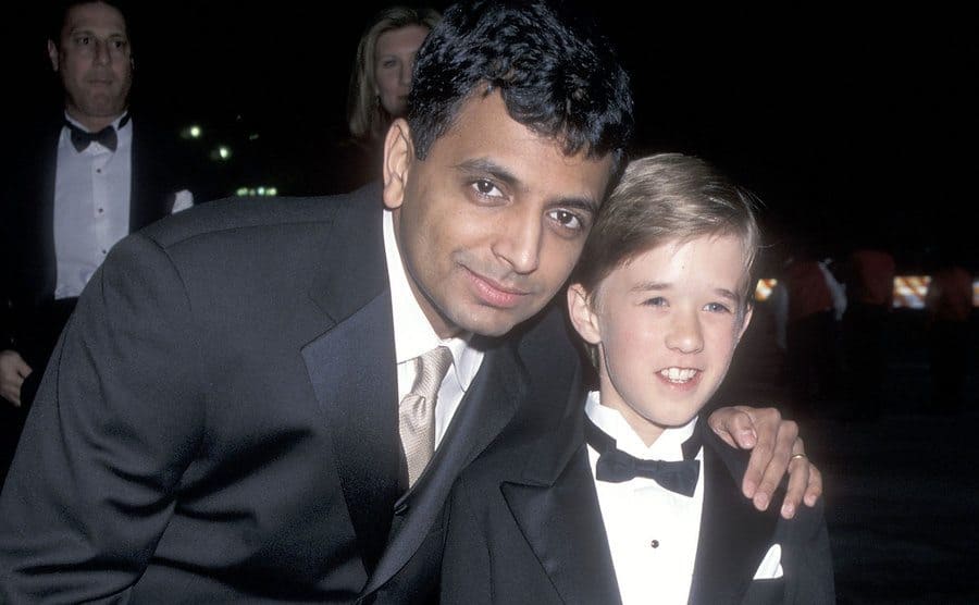 M. Night Shyamalan and Haley Joel Osment attend the 26th Annual People's Choice Awards. 