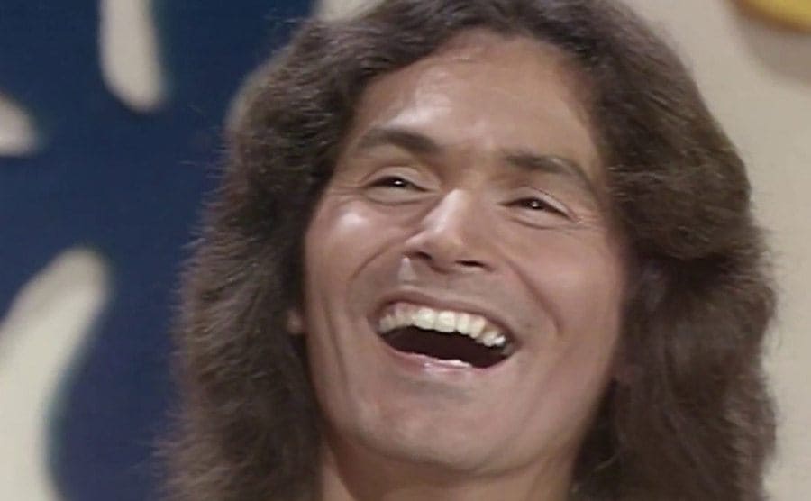 Rodney Alcala appears in a still from the television series the dating game.