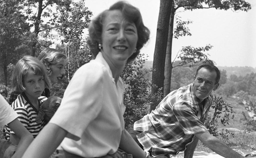 Jane Fonda, Frances de Villers Brokaw, Frances Fonda, and Henry Fonda enjoy a picnic day outside. 