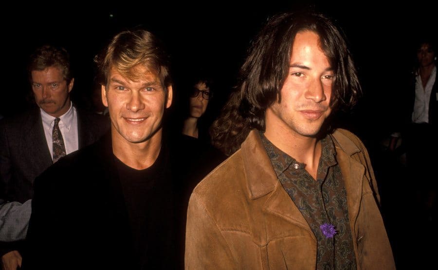 Patrick Swayze and Keanu Reeves attend the premiere of 