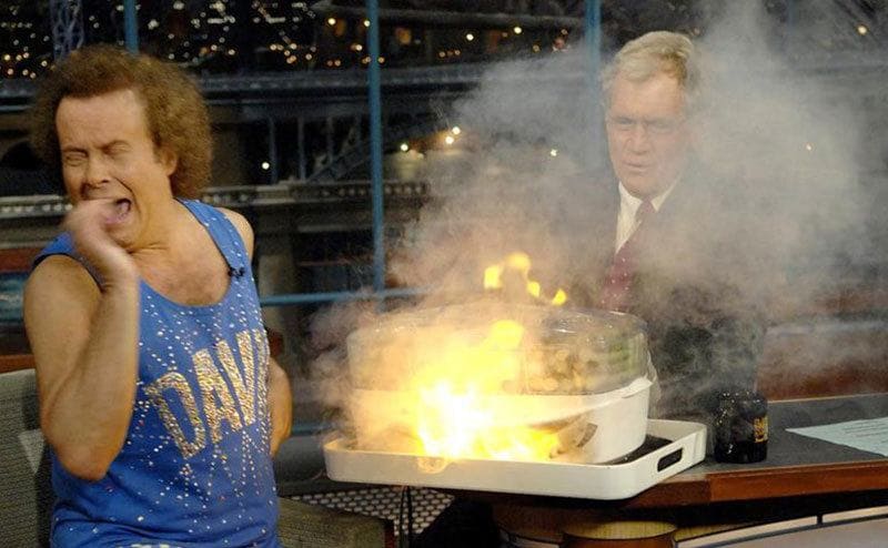 David Letterman sets a tray on fire.