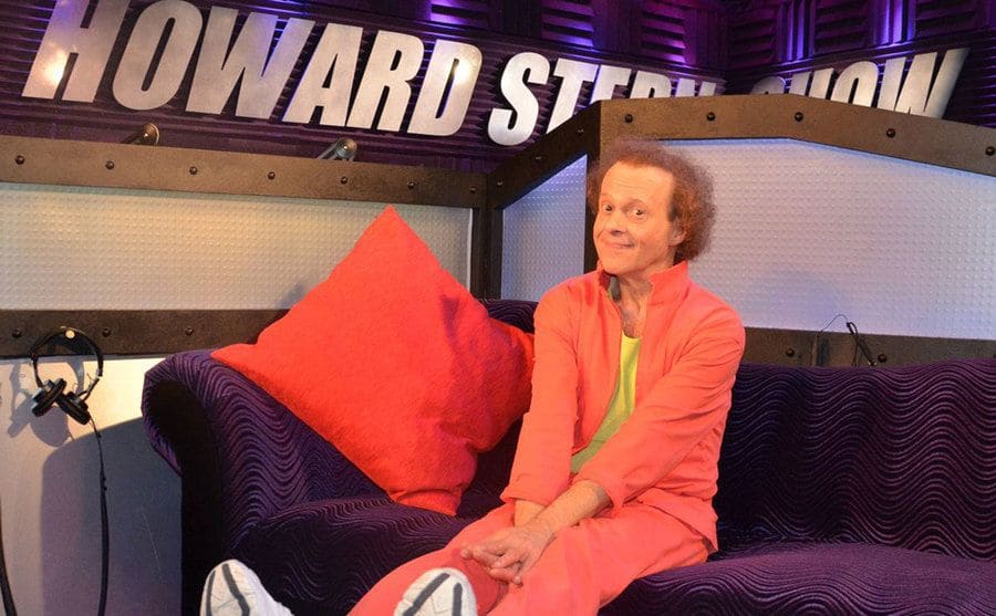 Richard Simmons sits backstage at the Howard Stern show. 
