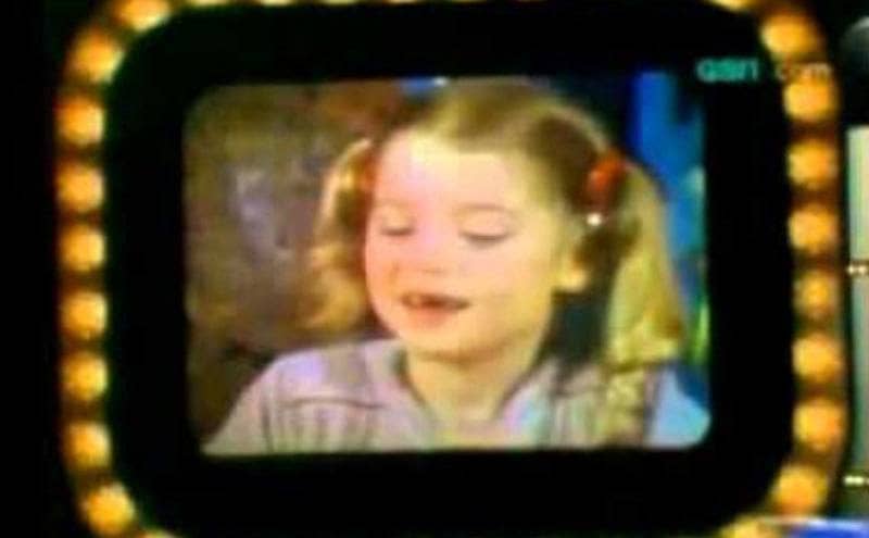 A still from Tara Reid in the game show Child’s Play.