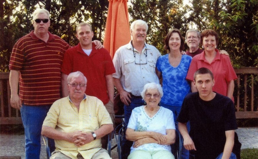 A group photo of Tyler and his family. 