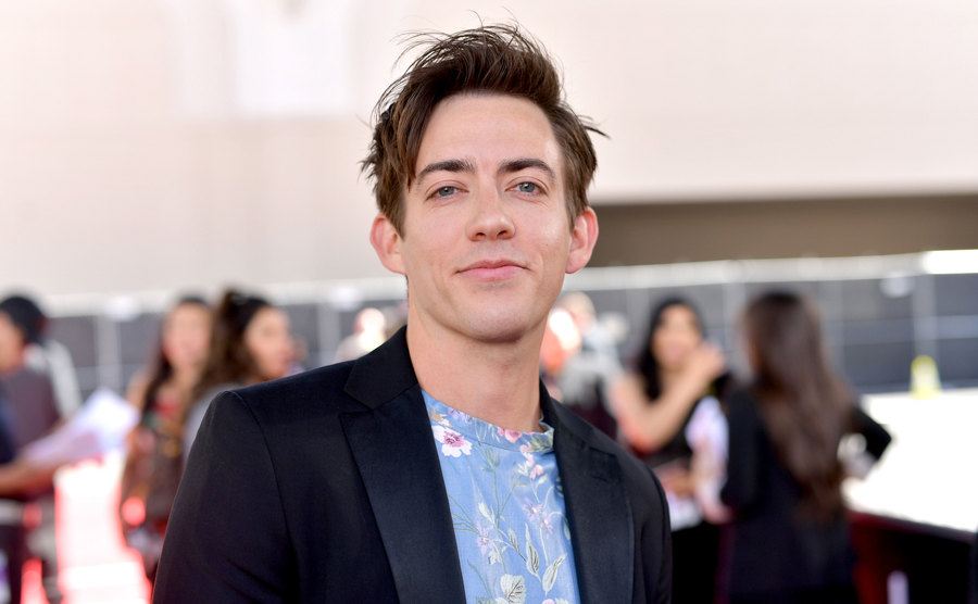 Kevin McHale grinning at the camera at the 2019 Billboard Music Awards.
