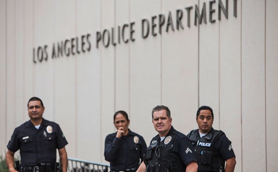 Police officers outside LAPD headquarters.