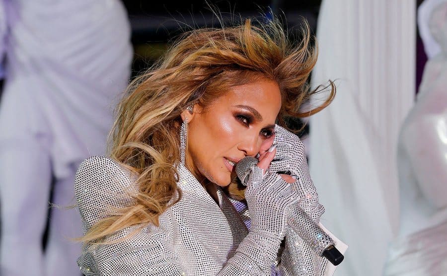 Jennifer performs at Times Square.