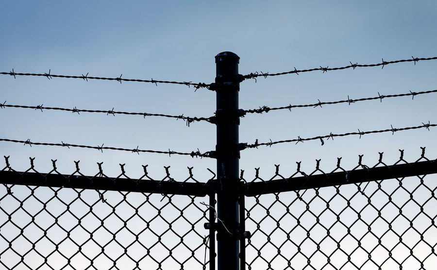A barbed-wire fence.