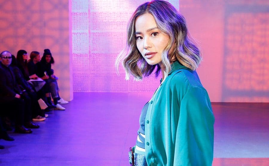 Jamie Chung attends a fashion show. 