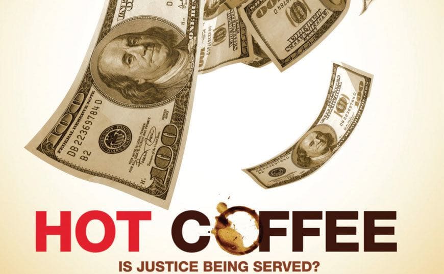 Dollar bills and a coffee spill in the ‘Hot Coffee’ promo shot.