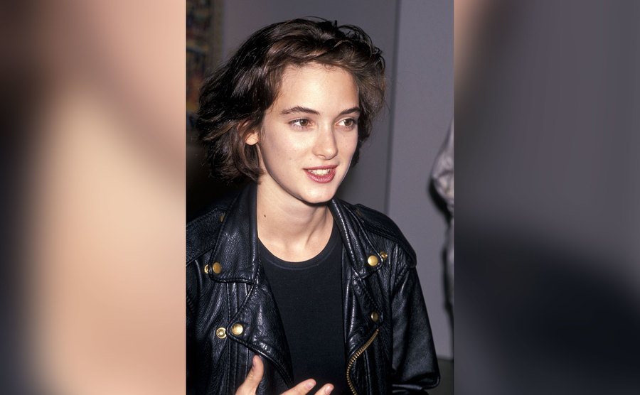 Winona Ryder is wearing a leather jacket.
