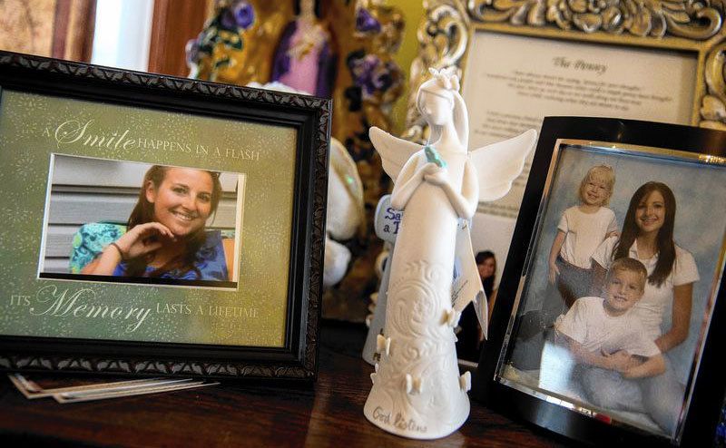 Photos of Alisha are placed in memory.