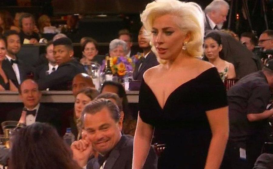 A still from Leonardo DiCaprio's expression as Lady Gaga passes by.