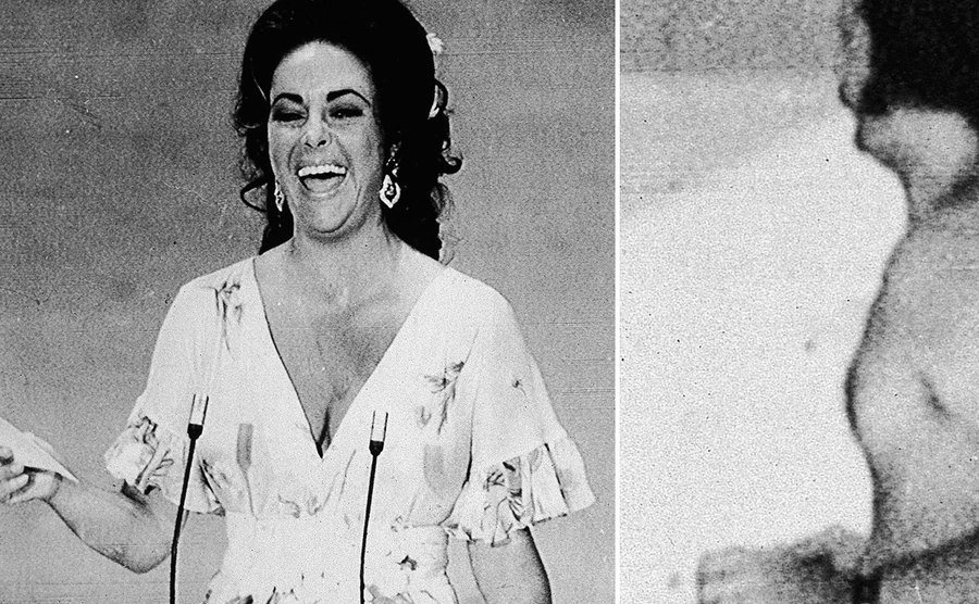 Elizabeth Taylor laughs as she remarks that a streaker interrupts the stage.