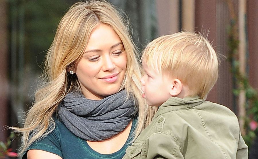 Hilary walks the streets with Luca.