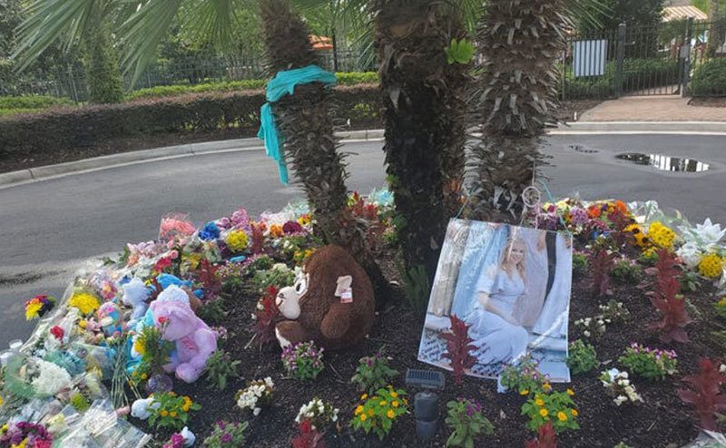 A memorial of flowers and stuffed animals for Tristyn.