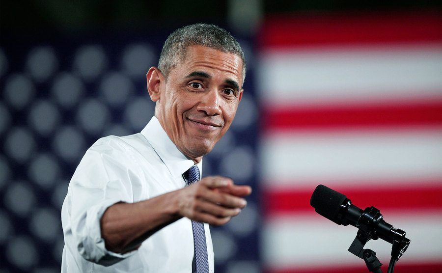 President Barack Obama speaks in front of a crowd. 