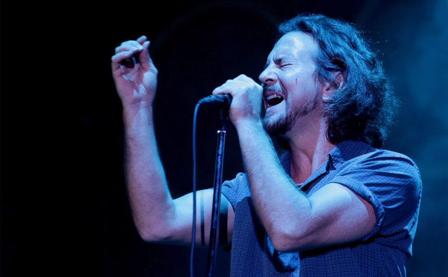Eddie Vedder of Pearl Jam performs on stage. 