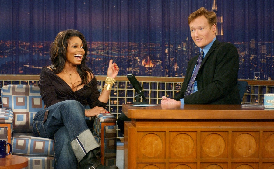 Janet Jackson jokes with Conan O'Brien during a taping of 