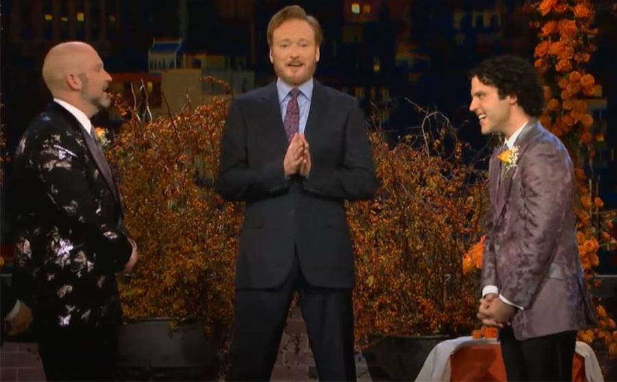 Conan is performing a same-sex wedding ceremony. 