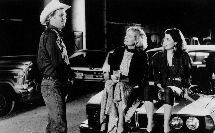 Jeff Bridges, Cybill Shepherd, and Annie Potts in a scene from 'Texasville,'
