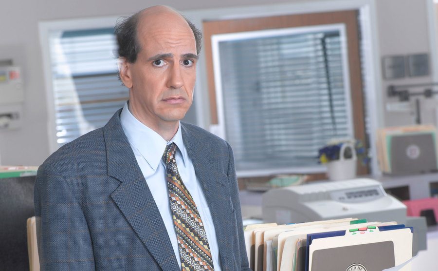 Sam Lloyd poses as Ted Buckland on the set of Scrubs. 