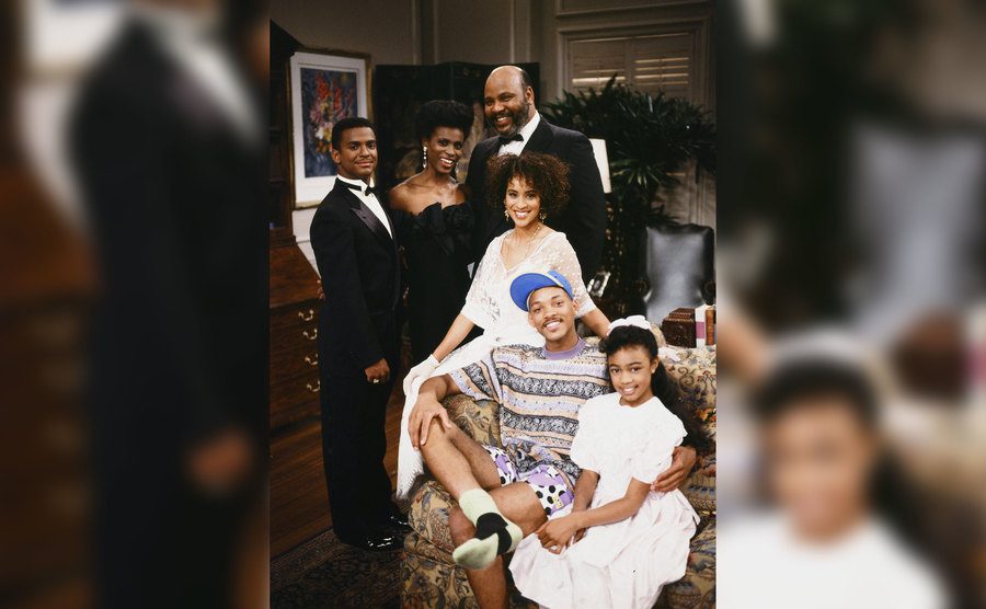 The cast of The Fresh Prince of Bel-Air poses on set. 