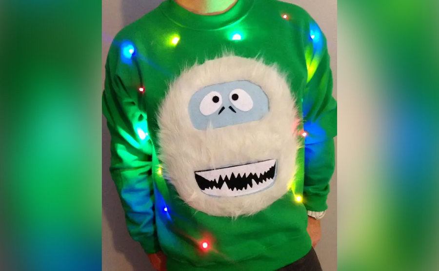 A sweater with a furry yeti on it. 