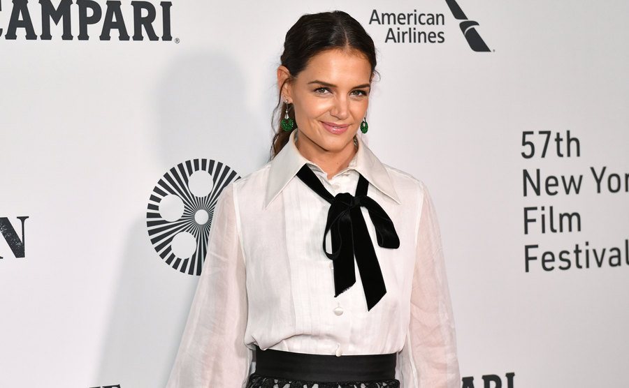 Katie Holmes poses for the press.