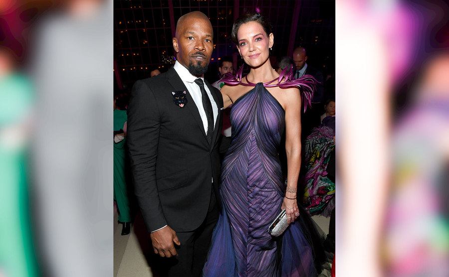 Jamie Foxx and Katie Holmes pose for the press.