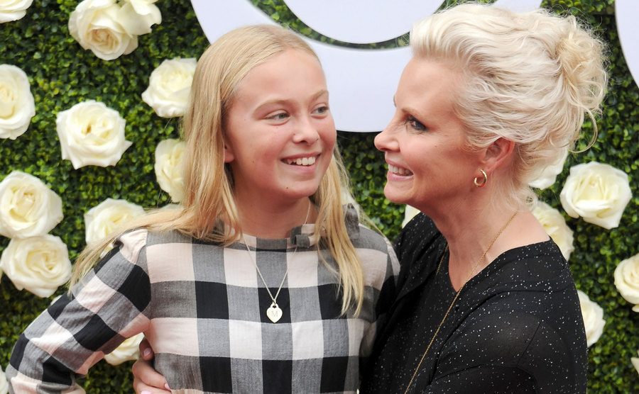 Monica Potter and her daughter attend an event.