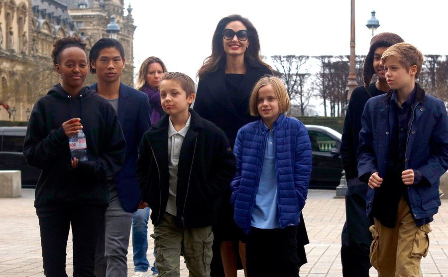A picture of Angelina with all of her children in Paris.