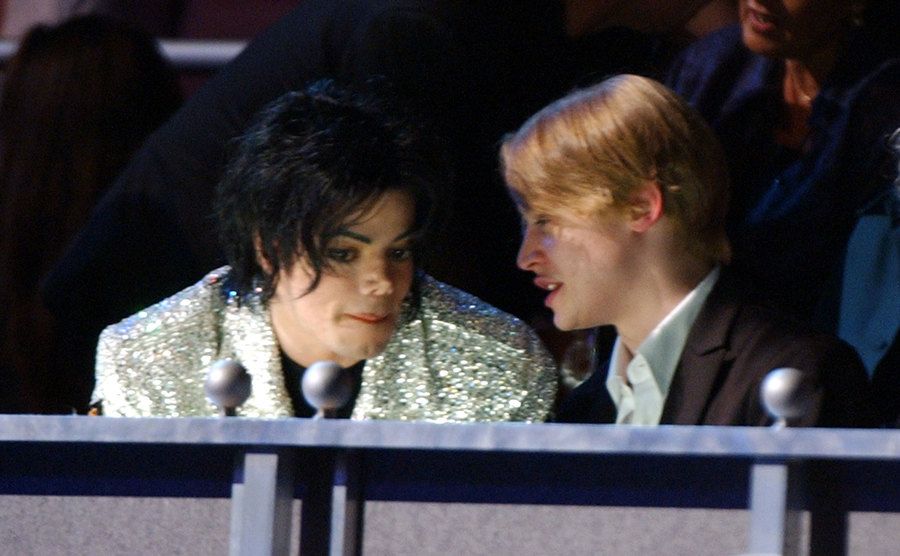 Michael Jackson and Macaulay during an event.