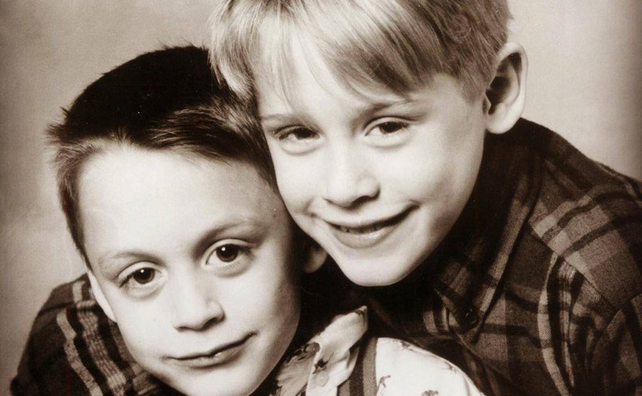 A dated picture of Macaulay and Kieran.
