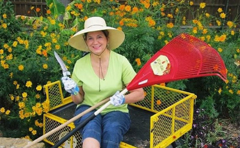 Kellie Martin is gardening out in her backyard. 