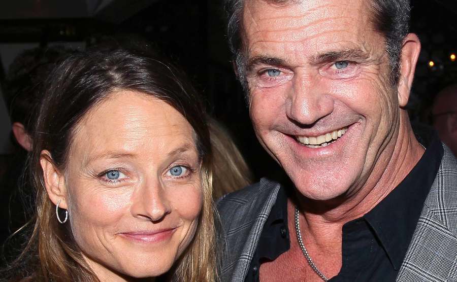 Mel Gibson embraces Jodie Foster as they pose for a picture.