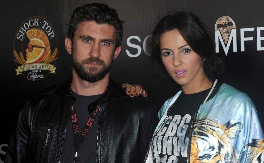 Louie Gibson and Annet Mahendru attend an event.