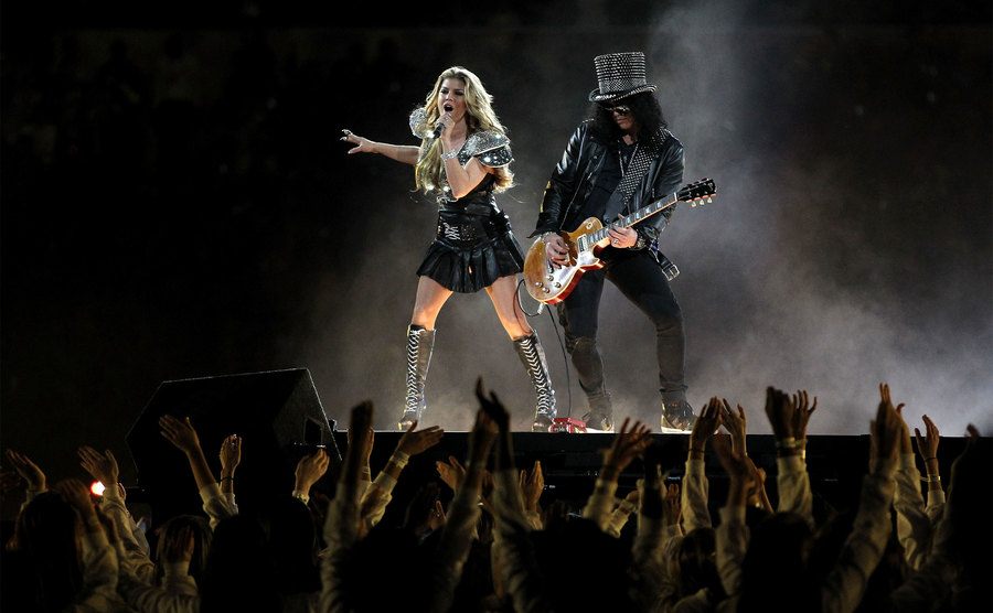 Fergie performs with Slash during the Bridgestone Super Bowl XLV Halftime Show. 