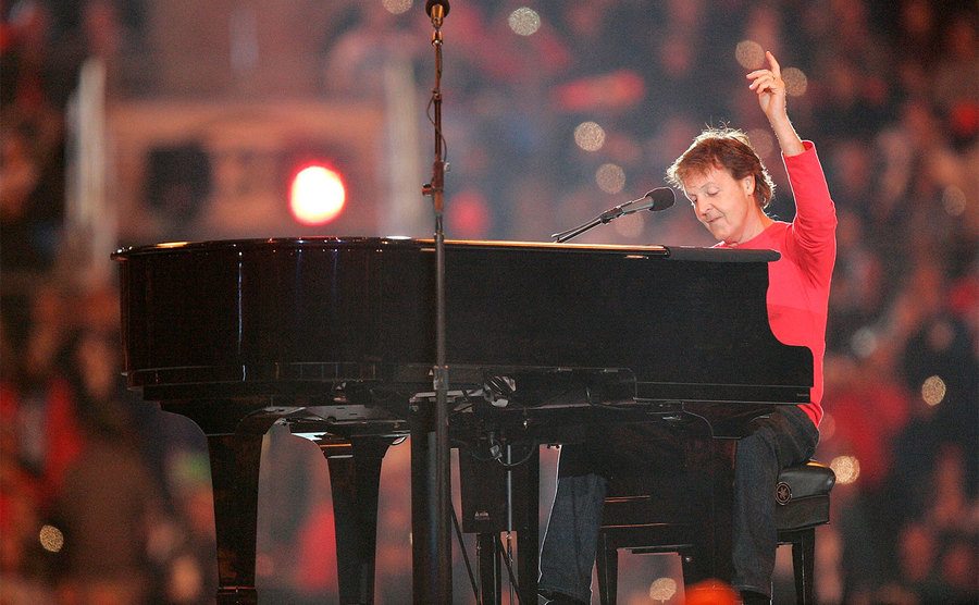 Paul McCartney performs at his piano during the Super Bowl XXXIX. 