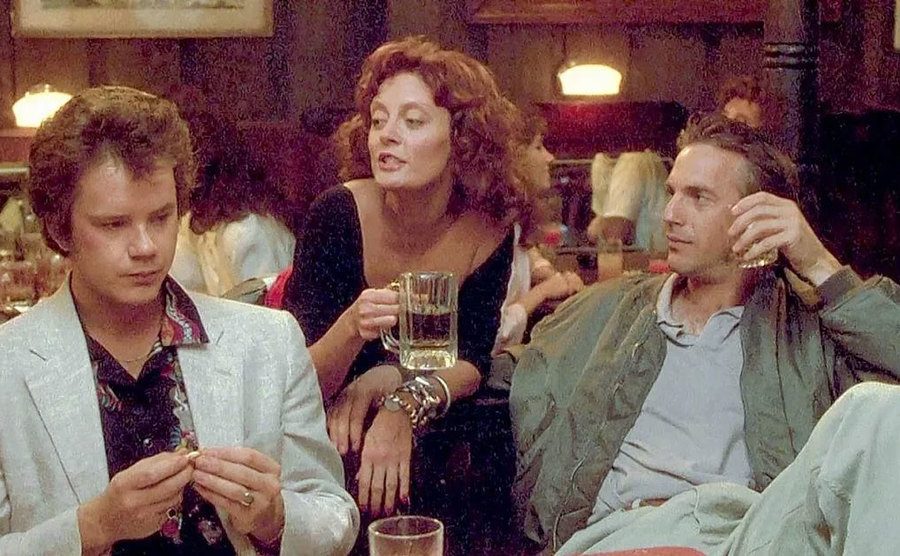 Robbins, Sarandon, and Costner in a scene from Bull Durham.