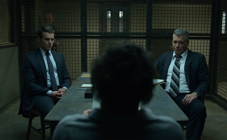 Jonathan Groff and Holt McCallany interview a serial killer in prison. 