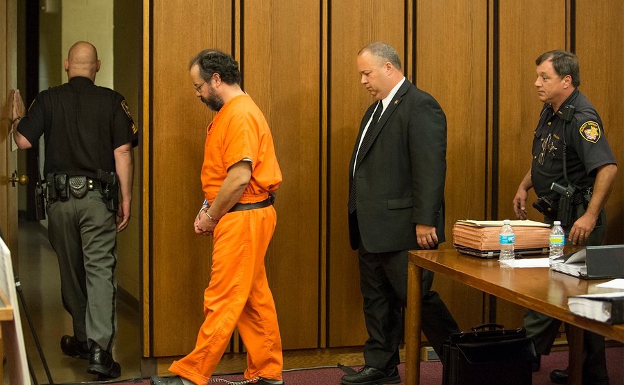 Ariel Castro is led out of the courtroom after being sentenced to life. 